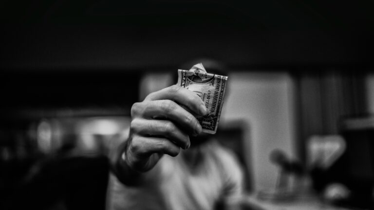 Customer withdrawing cash from an ATM inside a Washington, DC convenience store